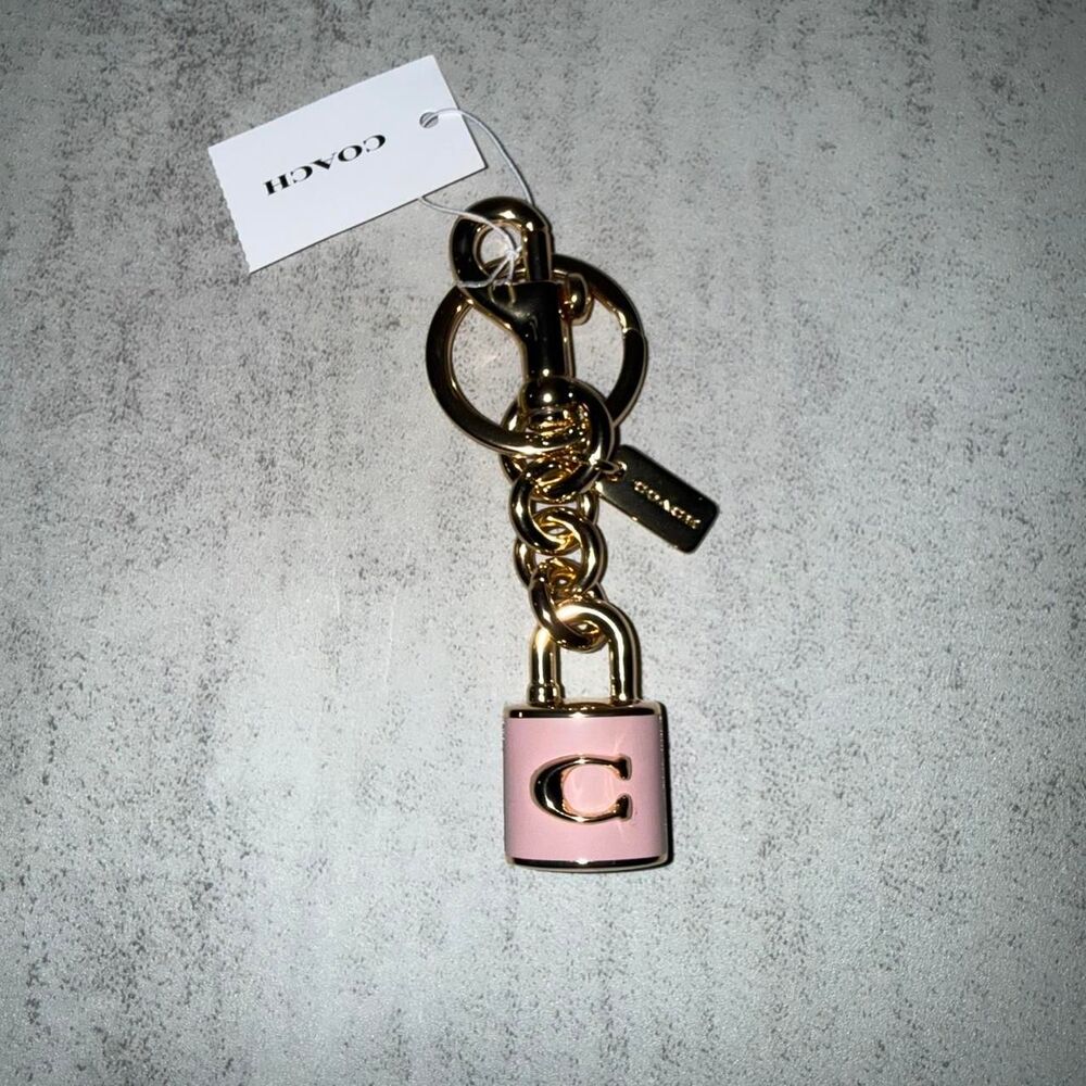 Coach pink lock keychain